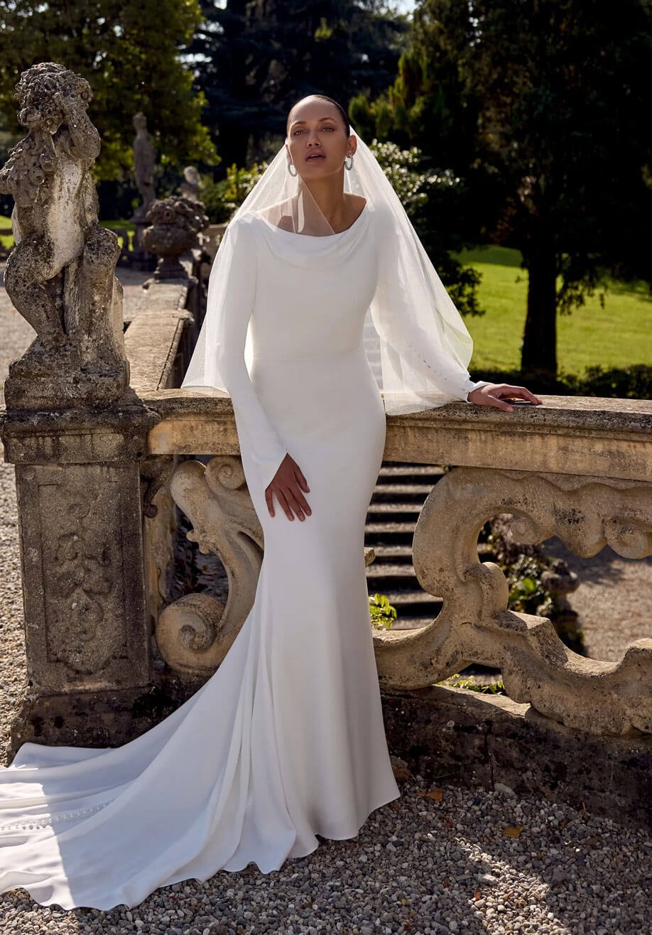 Model wearing a white gown