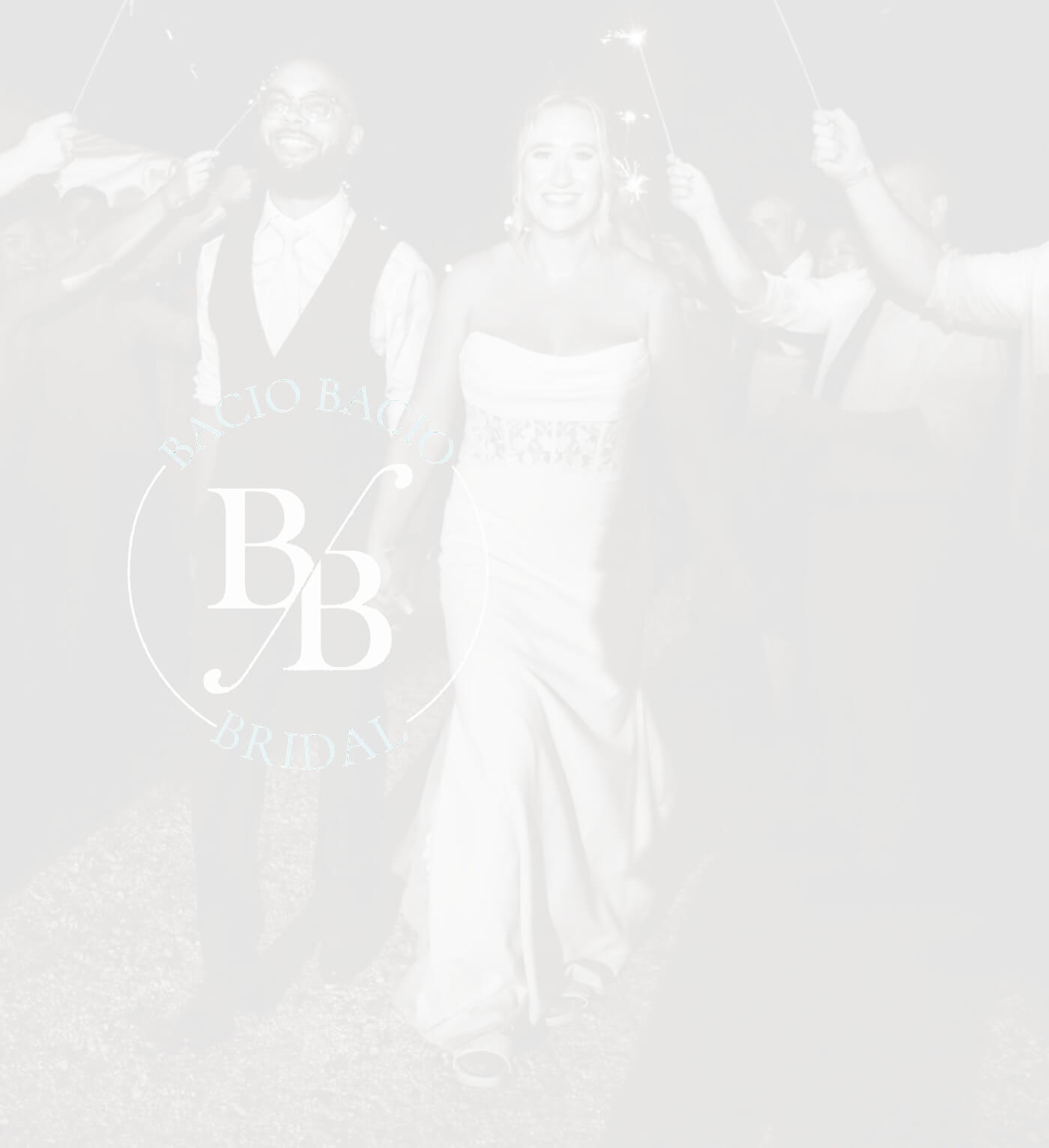 Сouple wearing a white gown and a black suit